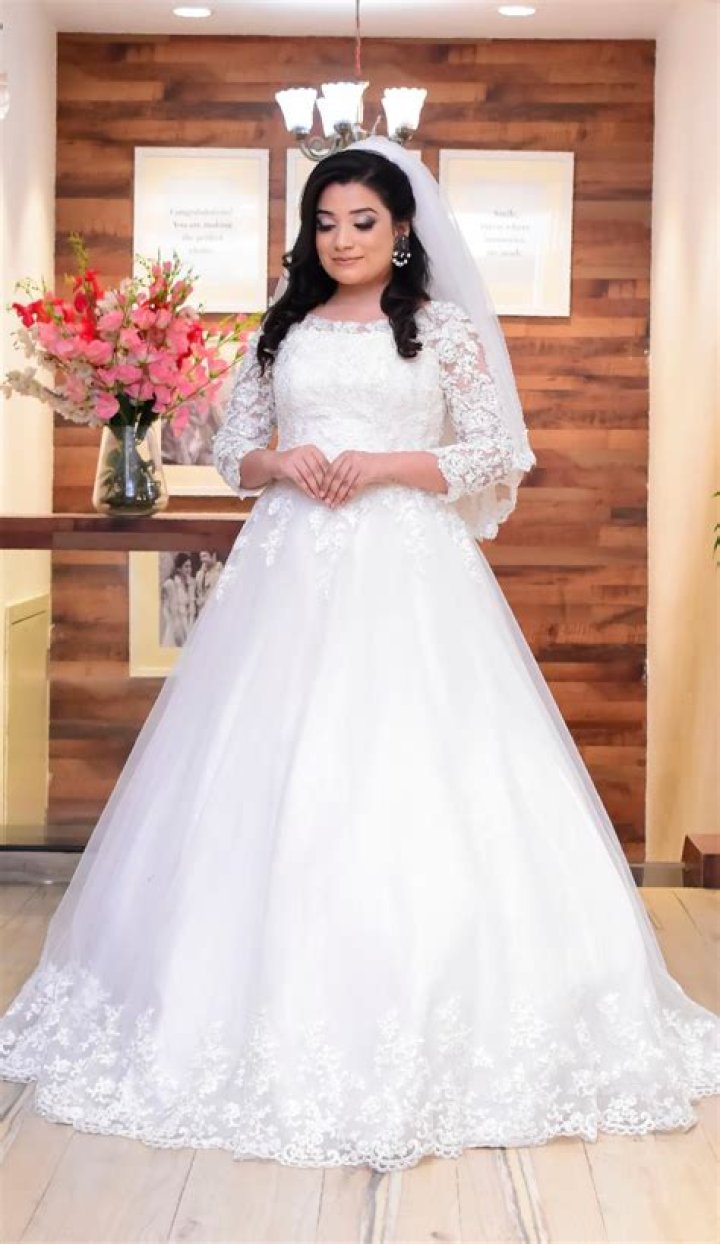 Unveil The Enchanting Beauty Of The Sei Gown: A Bridal Masterpiece